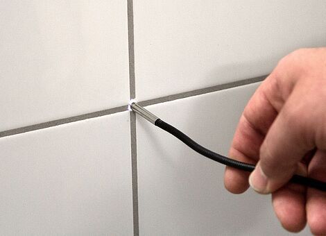 Video inspection of a tile junction